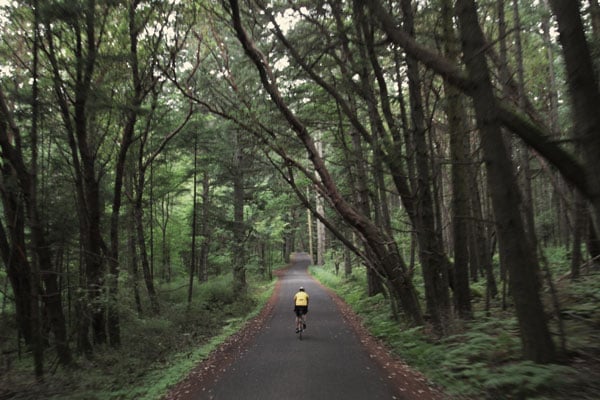 Man on bike searching for non 12 step rehab centers in the Northwest